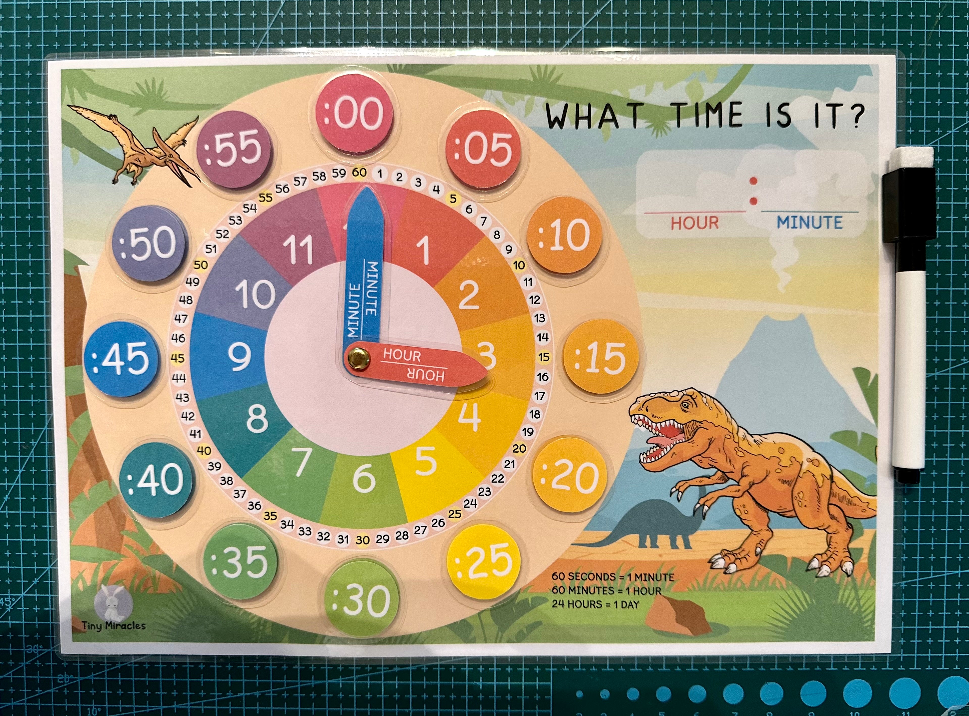 Educational clock chart with dinosaur illustrations 