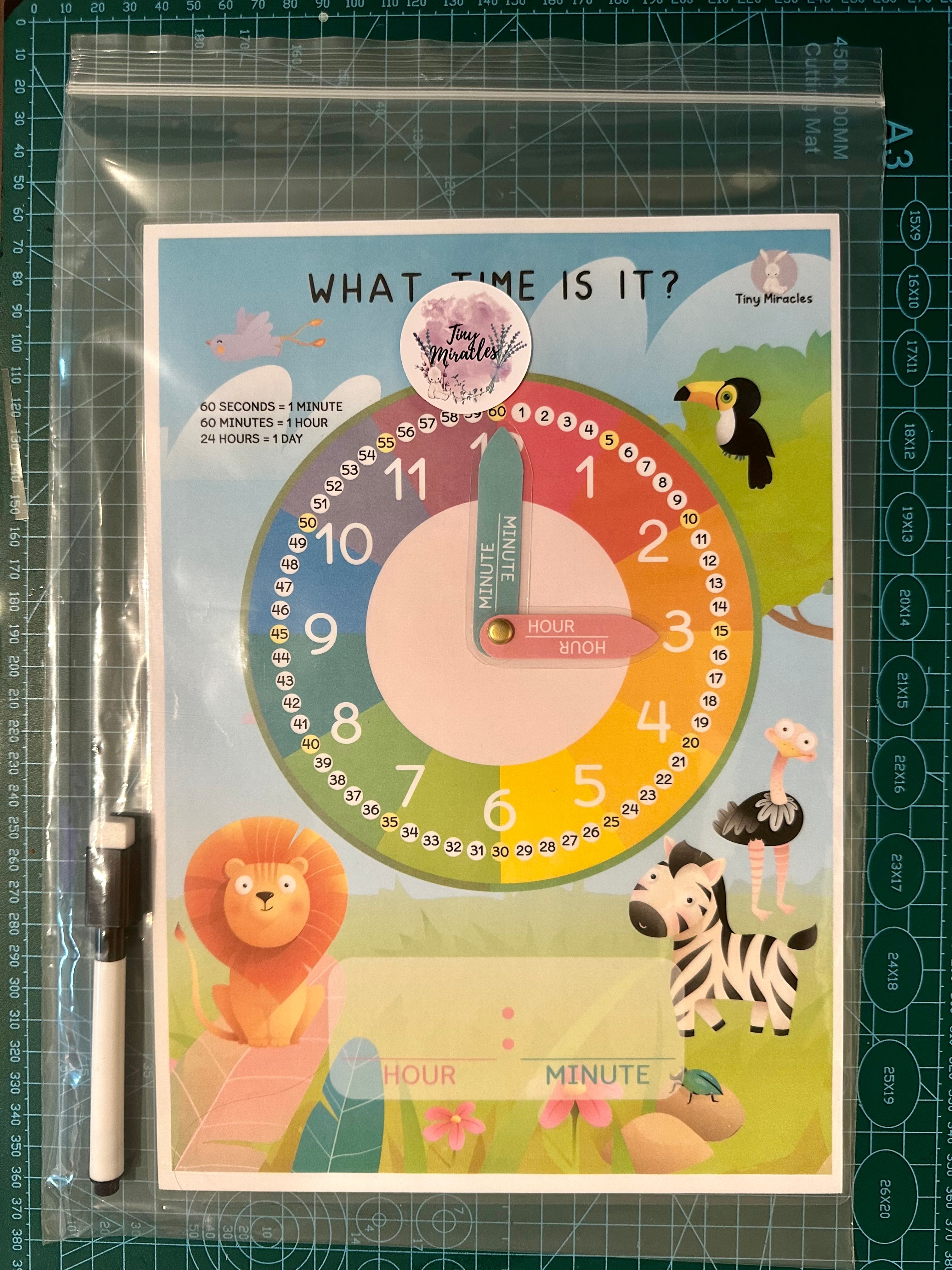 Educational clock poster for learning time with animal illustrations 