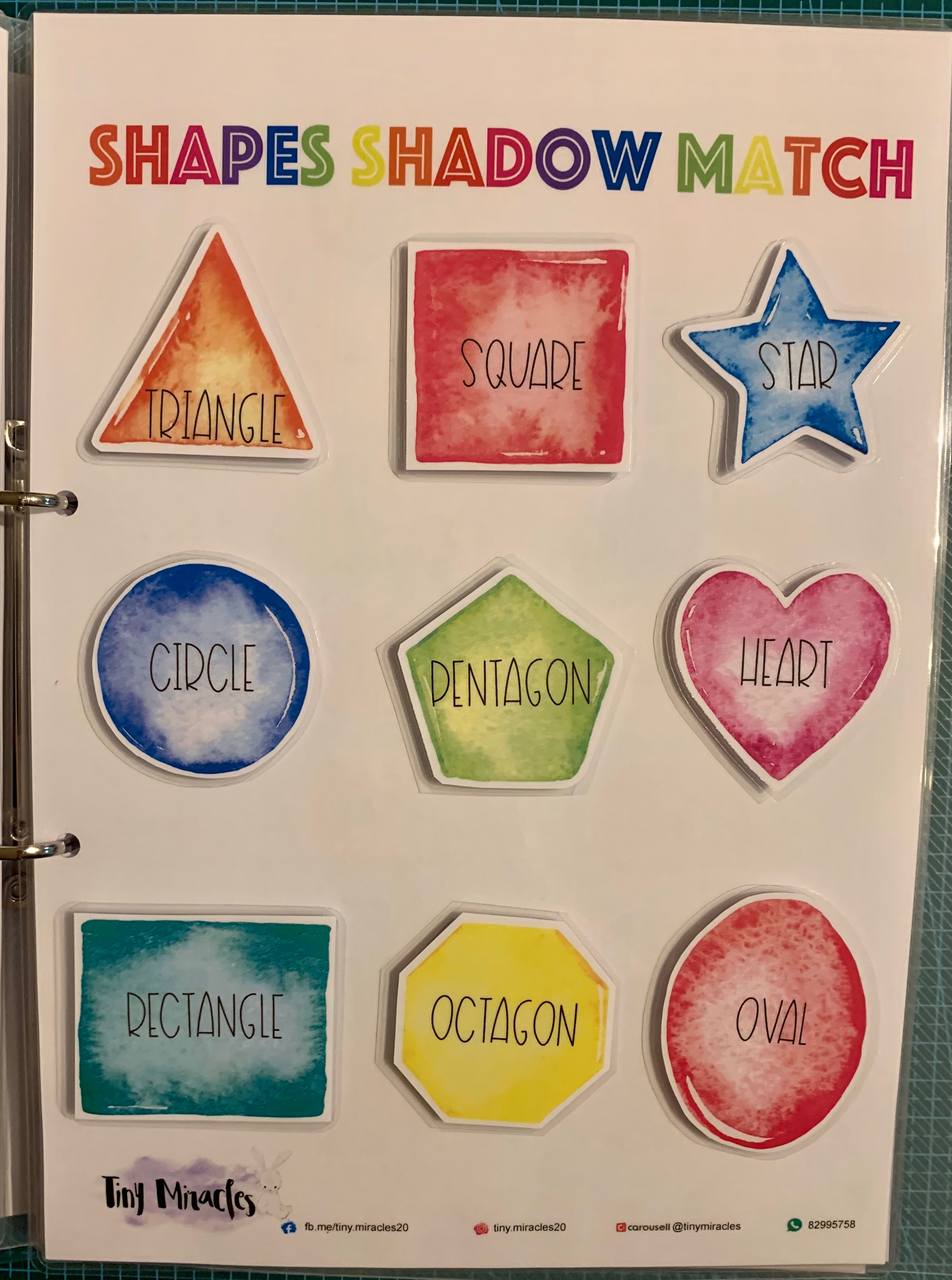 Shapes shadow match educational game with colorful shapes and labels.
